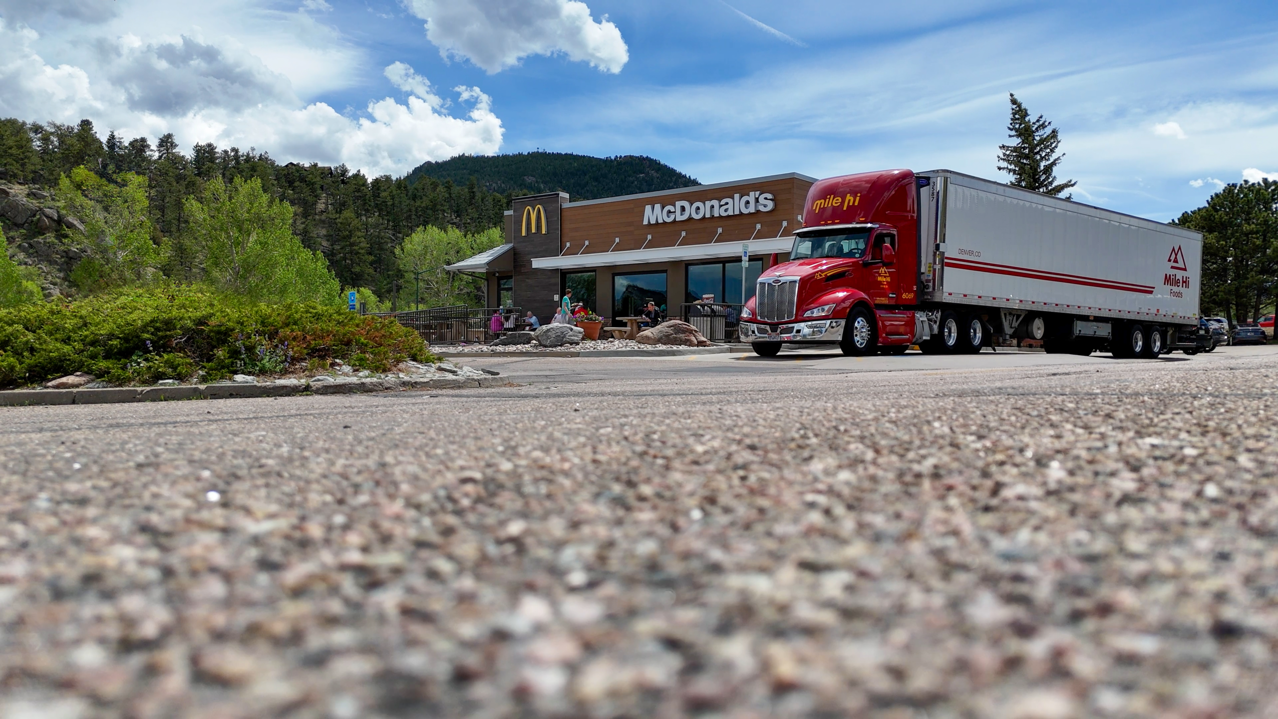Mile Hi Companies distribution truck featuring the updated brand